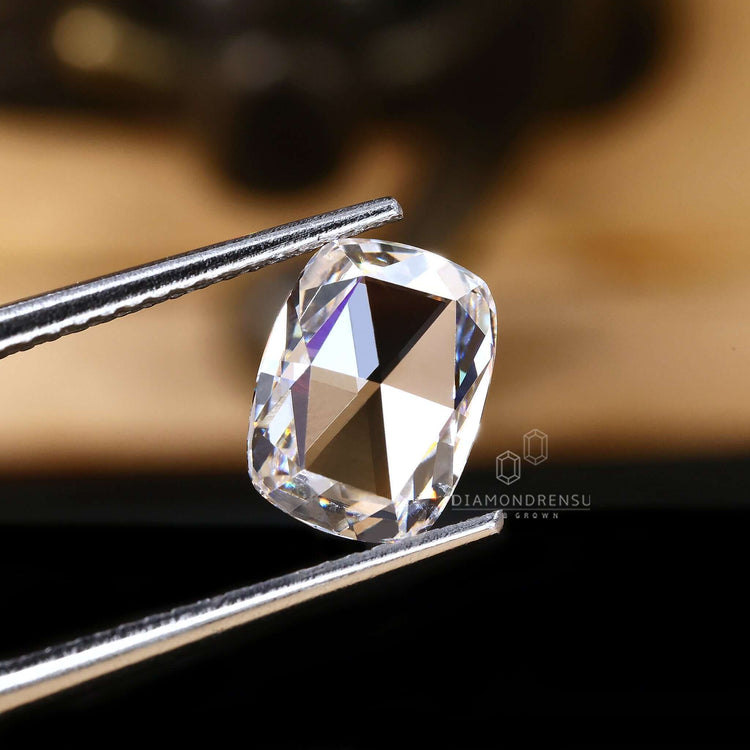 Loose antique cut diamond with an elegant elongated cushion rose cut.
