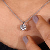 Model wearing diamond solitaire pendant