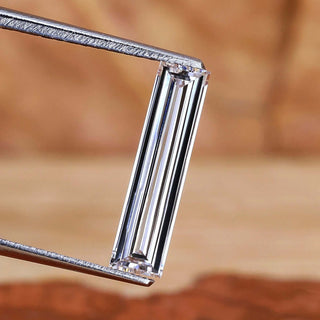 Long baguette cut diamond with 0.76 carat weight.
