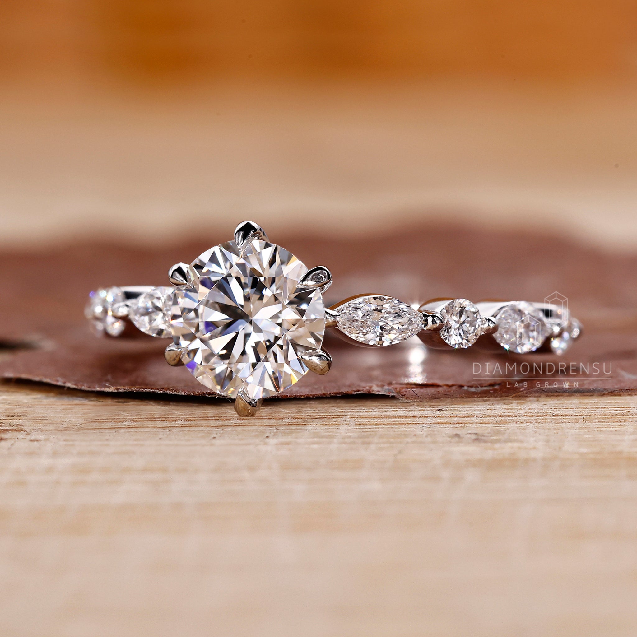 6 prong claw setting enhances the diamond’s brilliance.
