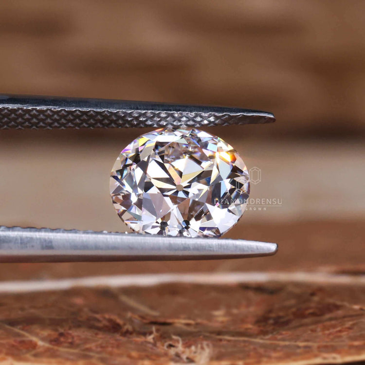 Lab grown diamond featured in round Old European cut design.