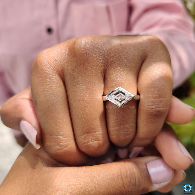 Diamondrensu engagement ring in a bezel setting.
