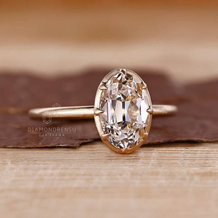 Handmade ring with Old European cut diamond in yellow gold.
