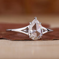 Pear Shaped Diamond Ring with stunning sparkle and elegance.
