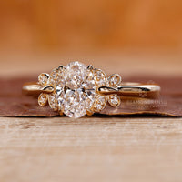Round brilliant cut diamond ring set with an oval diamond for a unique twist.
