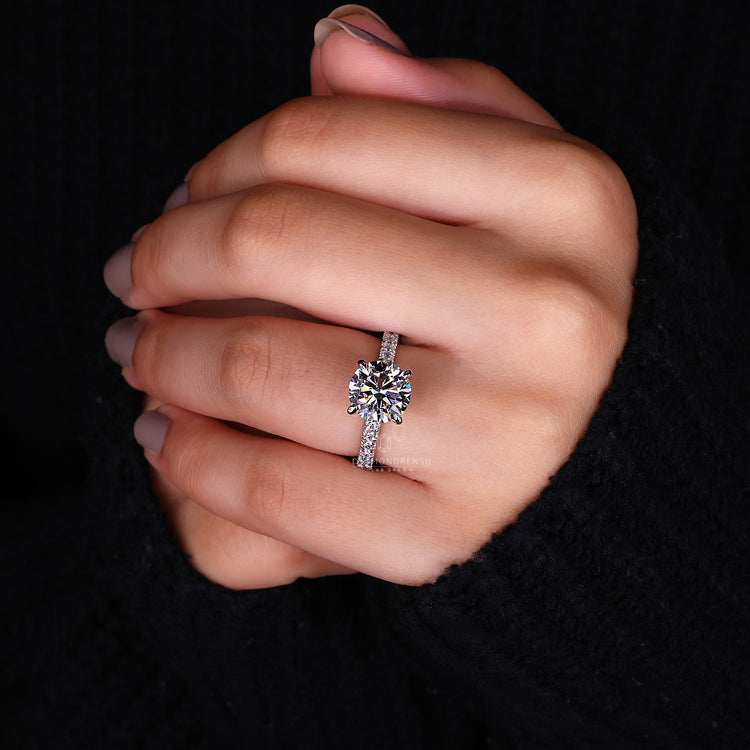 Pave Diamond Ring with secure claw prong setting.