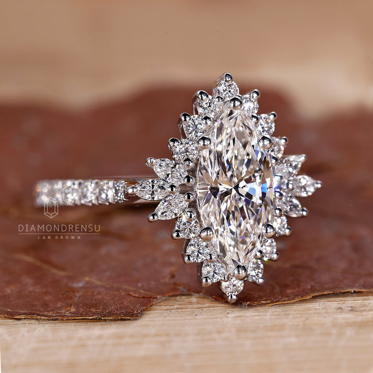 Halo ring with a marquise cut diamond for a unique look.
