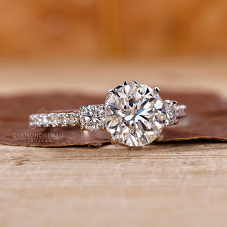 Unique round cut diamond engagement ring with a handmade touch.