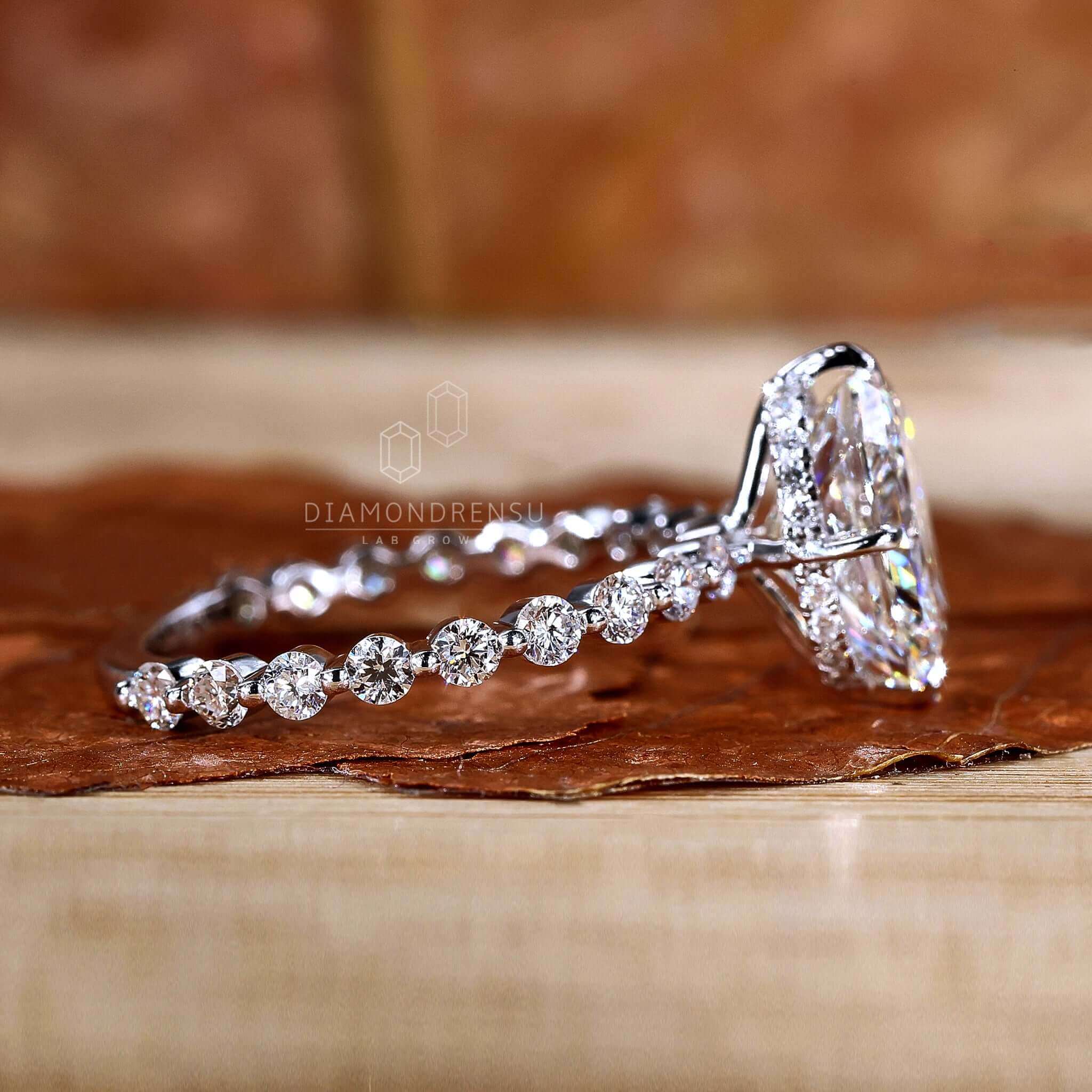 floating bubble pave engagement ring