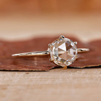 Round Solitaire Engagement Ring with a stunning round diamond.
