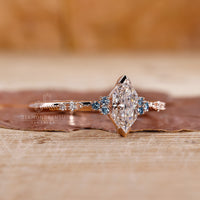 Custom engagement ring featuring a lab grown diamond and round cut side diamonds for extra sparkle.
