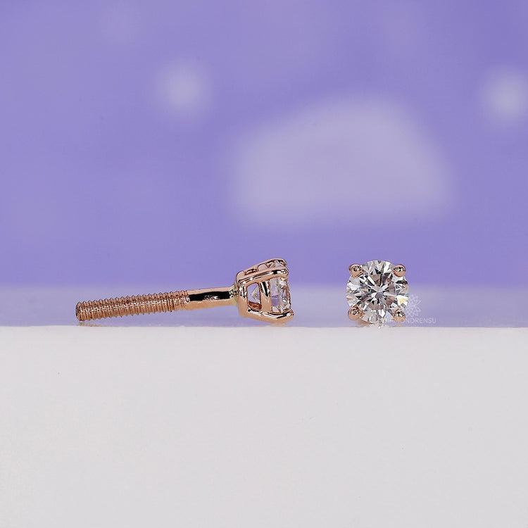Exquisite round stud diamond earrings with a 4 prong setting.
