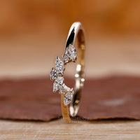 Prong set wedding band for secure diamond settings.
