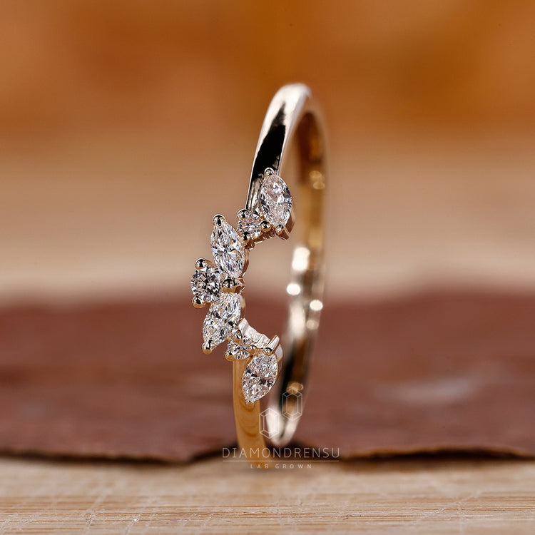 Prong set wedding band for secure diamond settings.
