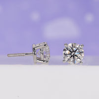 Beautiful round diamond in push back earrings design for everyday style.
