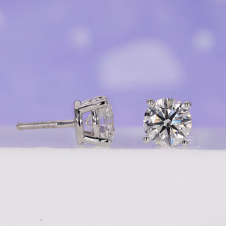 Beautiful round diamond in push back earrings design for everyday style.

