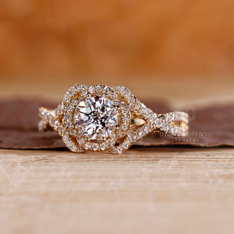 Lab-grown diamond halo engagement ring with twisted pave setting.
