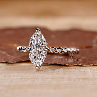 Buy lab-grown ring featuring a marquise diamond, offering an ethical and affordable choice.
