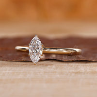 Buy diamond ring with IGI certified marquise cut and tapered shank.
