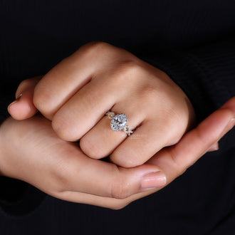 Classic halo engagement ring with intricate craftsmanship.
