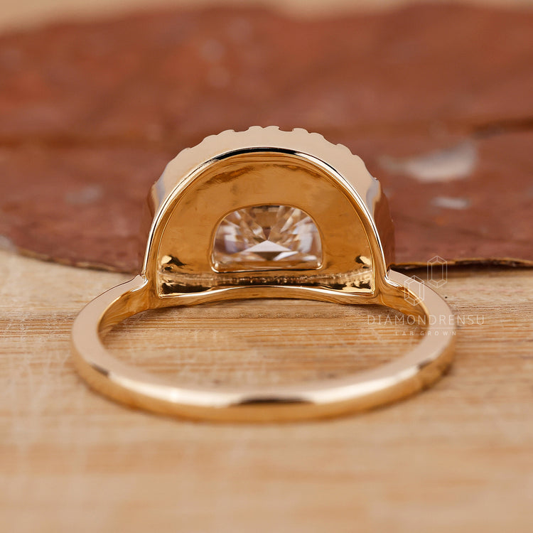 Yellow gold engagement ring with custom engagement ring.
