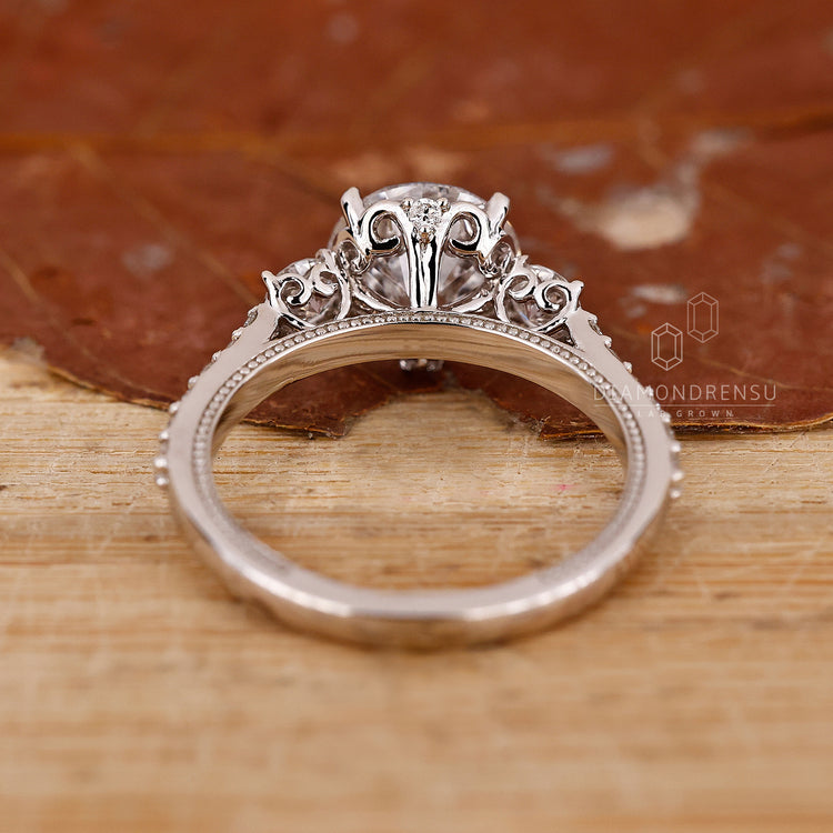 Buy engagement ring featuring a lab-grown diamond and prong setting.