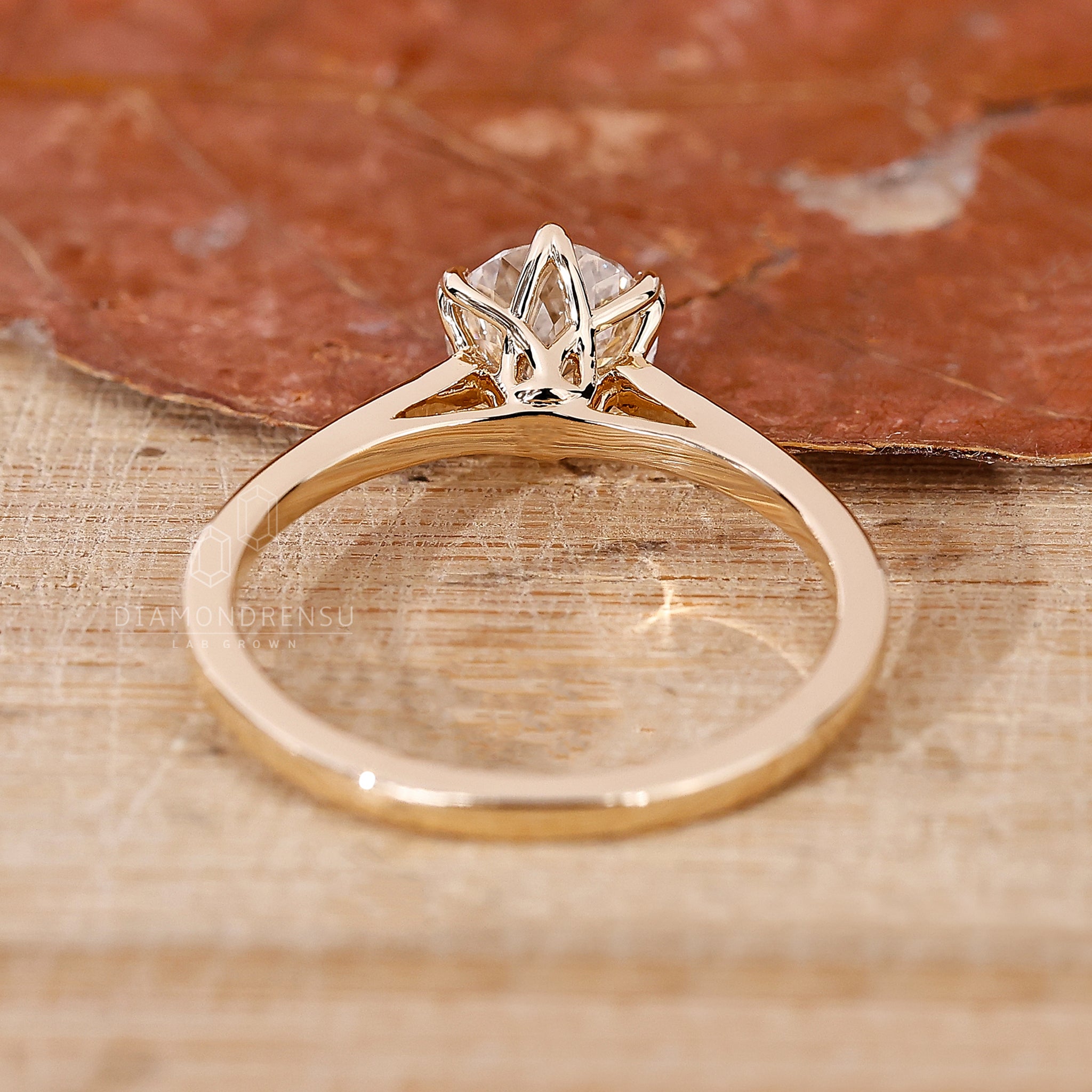 6 Prong Cathedral Setting holding a radiant Lab Grown Diamond.
