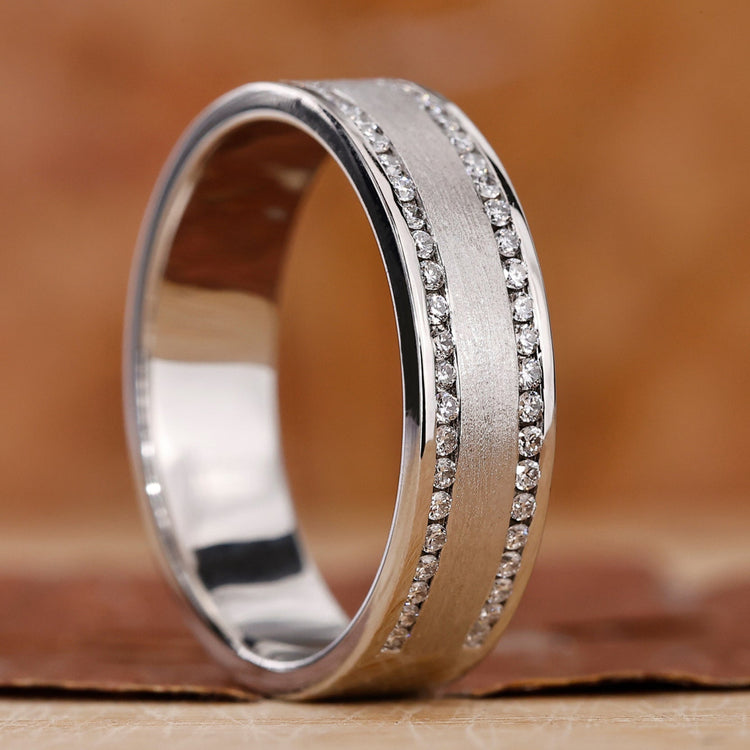 Mens white gold diamond ring with a sleek and modern design.
