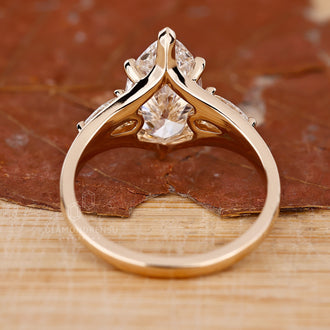 V Shaped Prong Setting enhancing the marquise diamond's sparkle.