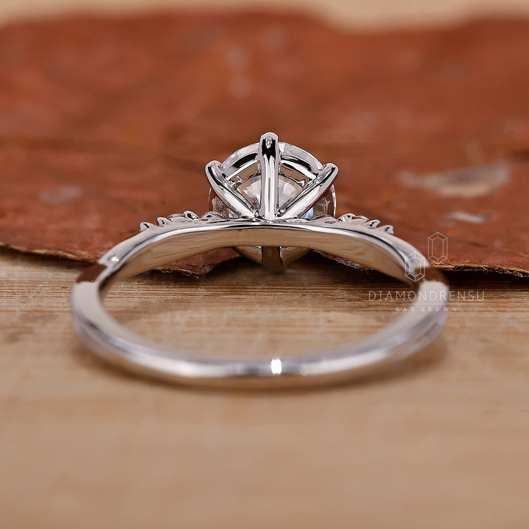 A classic round diamond engagement ring with impeccable detail.
