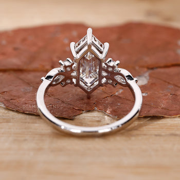 Nature inspired elongated hexagon diamond ring.