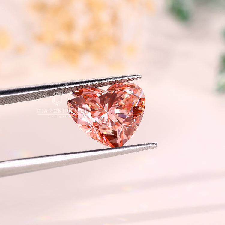 Buy loose diamond in a pink heart cut, perfect for custom fine jewelry.
