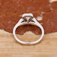 Trillion Cut Diamond Ring in a classic engagement design.