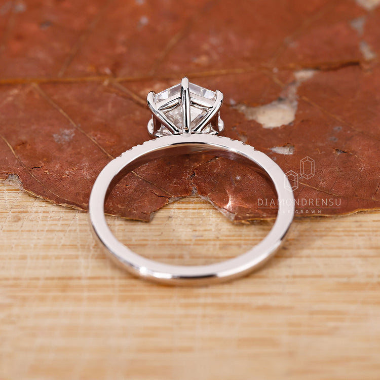 Claw Prongs securing a diamond in an elegant setting.