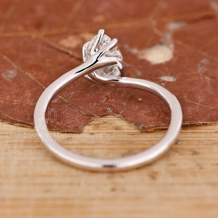 Solitaire Ring with a captivating pear-shaped diamond centerpiece.
