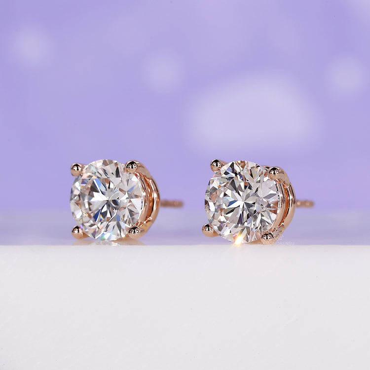 3 carat diamond stud earrings with prong setting for ultimate sparkle.