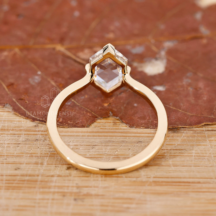 Solitaire marquise rose cut diamond engagement ring.