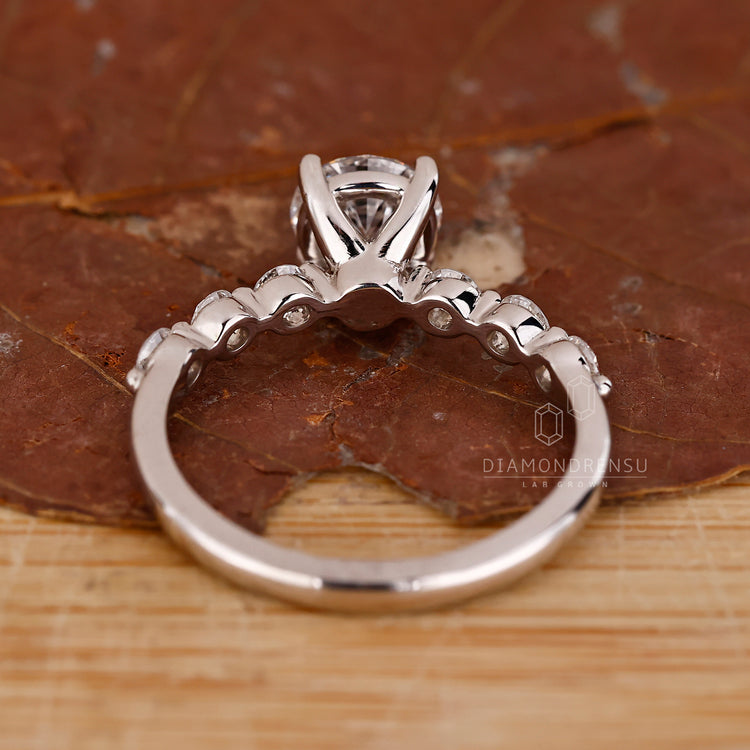 Diamondrensu engagement ring featuring custom 7 stone design.
