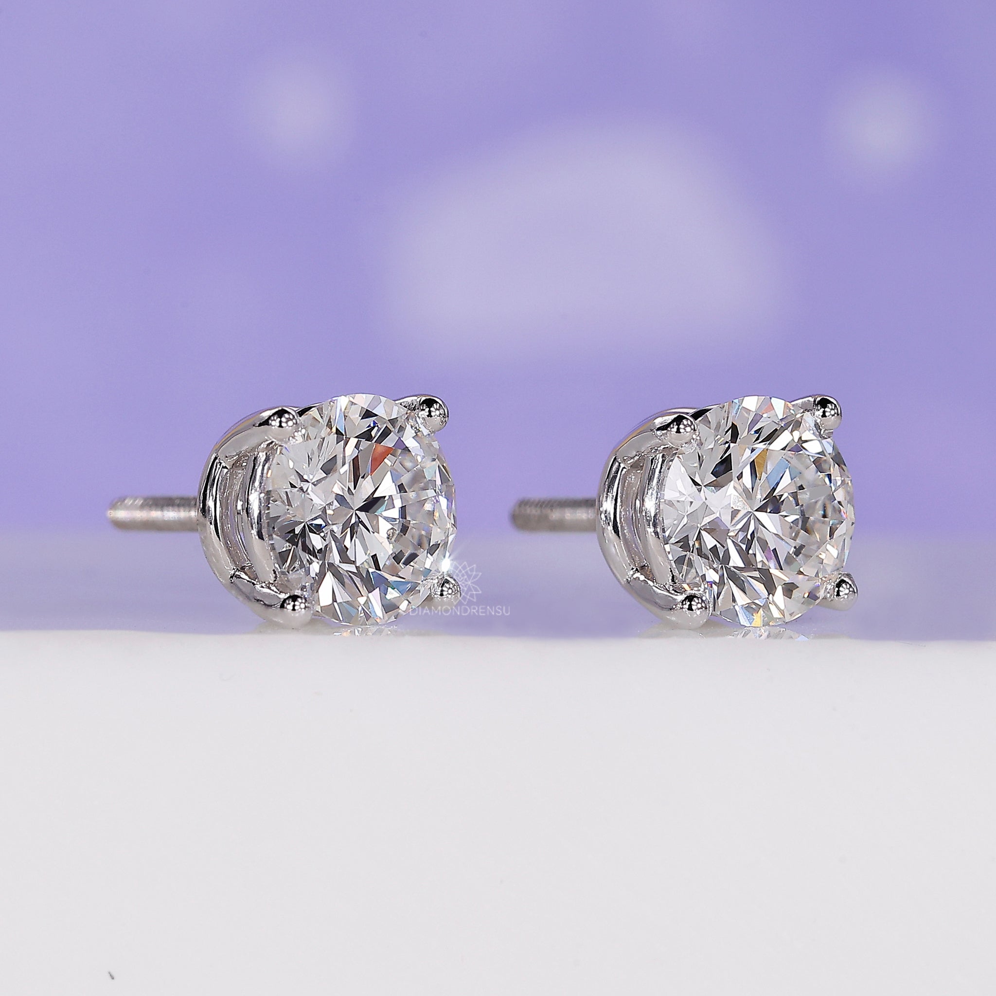 Stud earrings for women designed with screw back diamond earrings for added safety.
