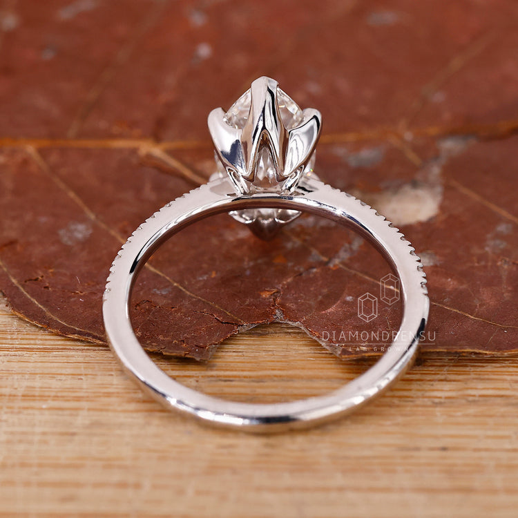 Diamondrensu marquise cut solitaire engagement ring.
