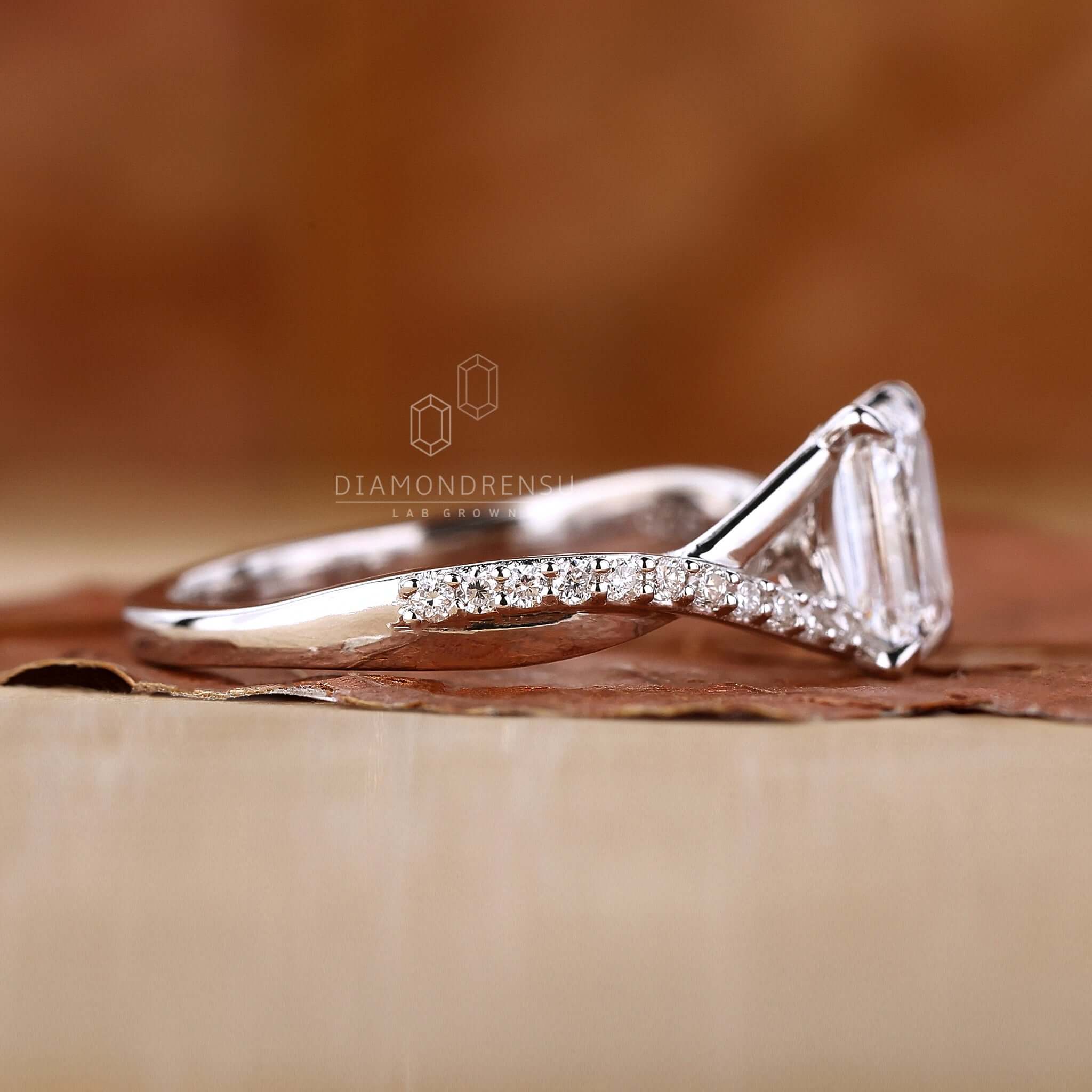 Eco-friendly lab-grown emerald cut diamond, showcasing its ethical and brilliant beauty.