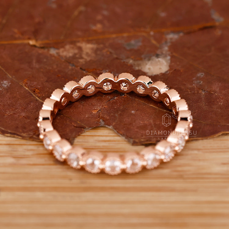 Eternity wedding band in rose gold.

