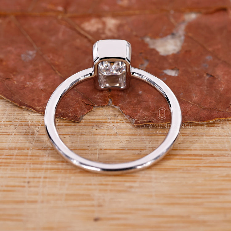 Emerald Cut Solitaire Ring for a sophisticated look.