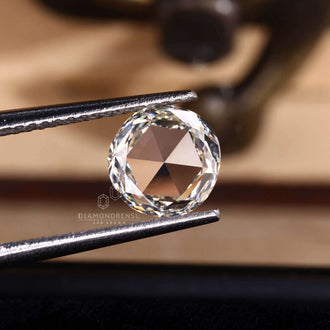 The round rose cut diamond is lab created and certified.
