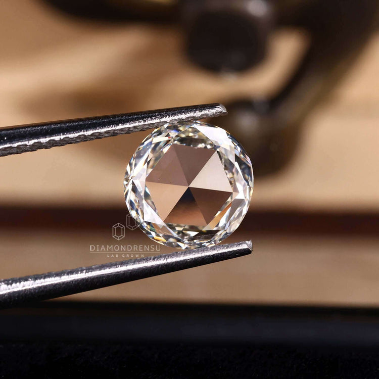 The round rose cut diamond is lab created and certified.
