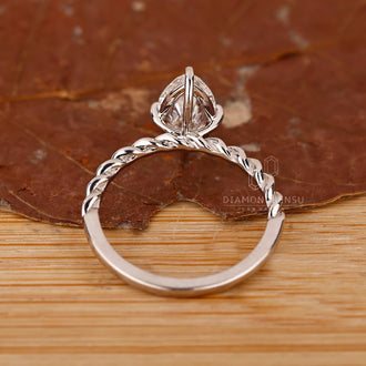Buy diamond ring with a solitaire diamond, designed for a classic yet modern appeal.
