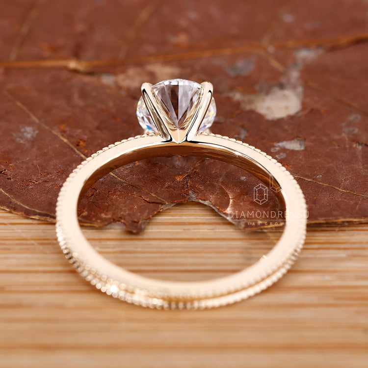 Lab Grown Diamond used in round cut diamond ring for white or yellow gold options.
