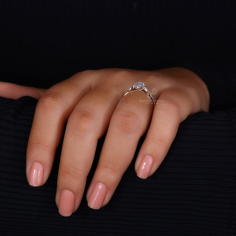 Round cut diamond ring with a sleek and modern look.
