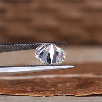 Lab grown round Old European cut diamond fits beautifully in classic rings.