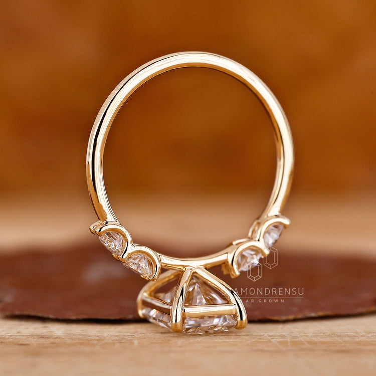 Ring yellow gold diamond with a radiant cut engagement ring design.
